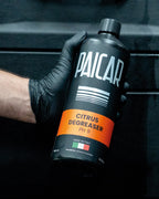 Butelka PAICAR Citrus Degreaser pH 9 w dłoni, zdjęcie producenta